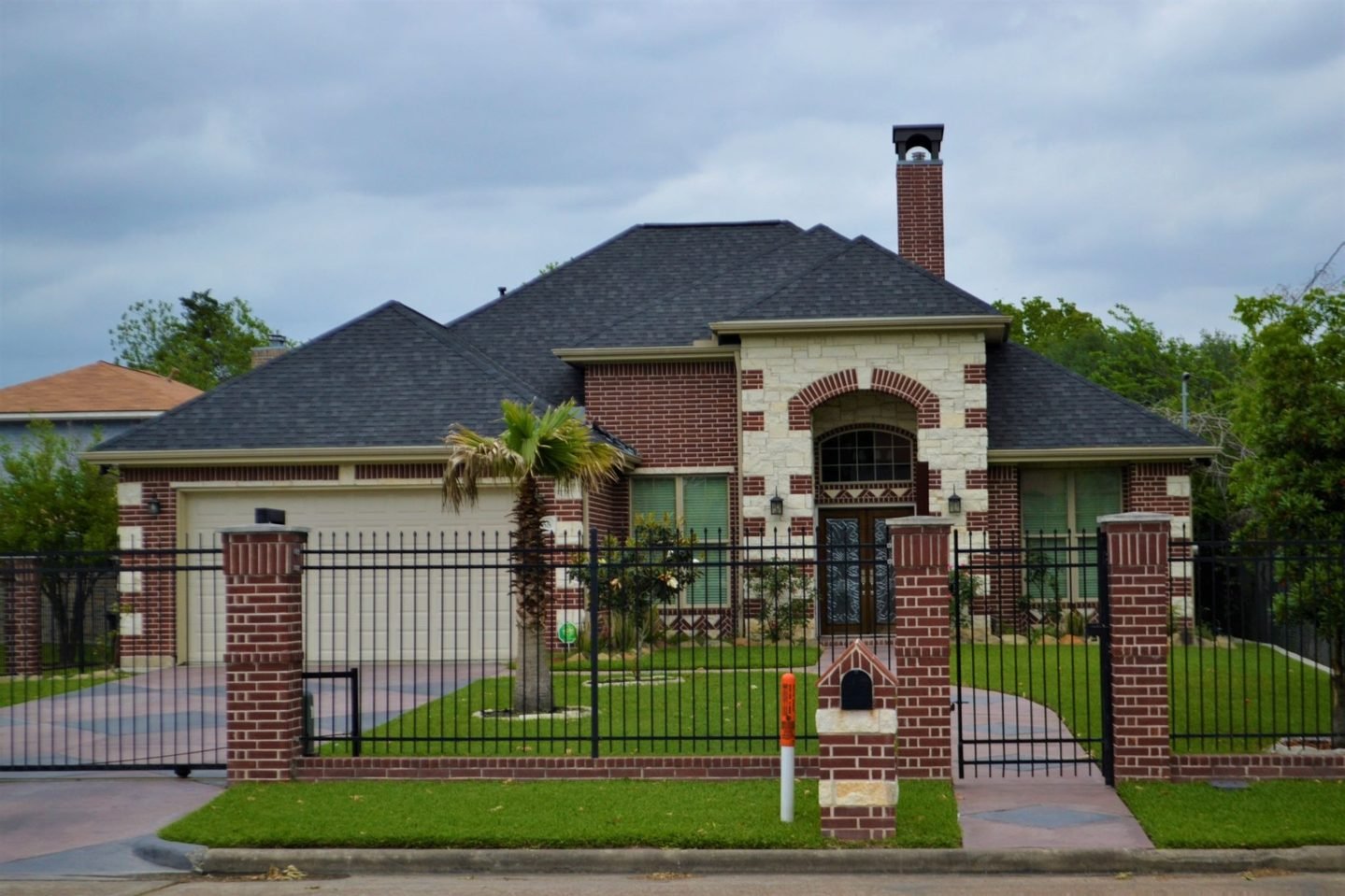 Boosting Curb Appeal and Security with a New Driveway Gate